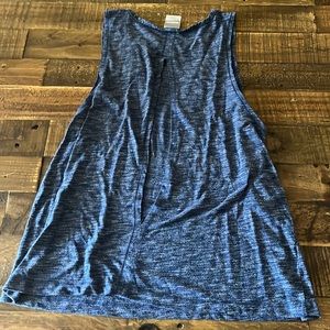 Gym shirt, worn couple times with a slit in the back